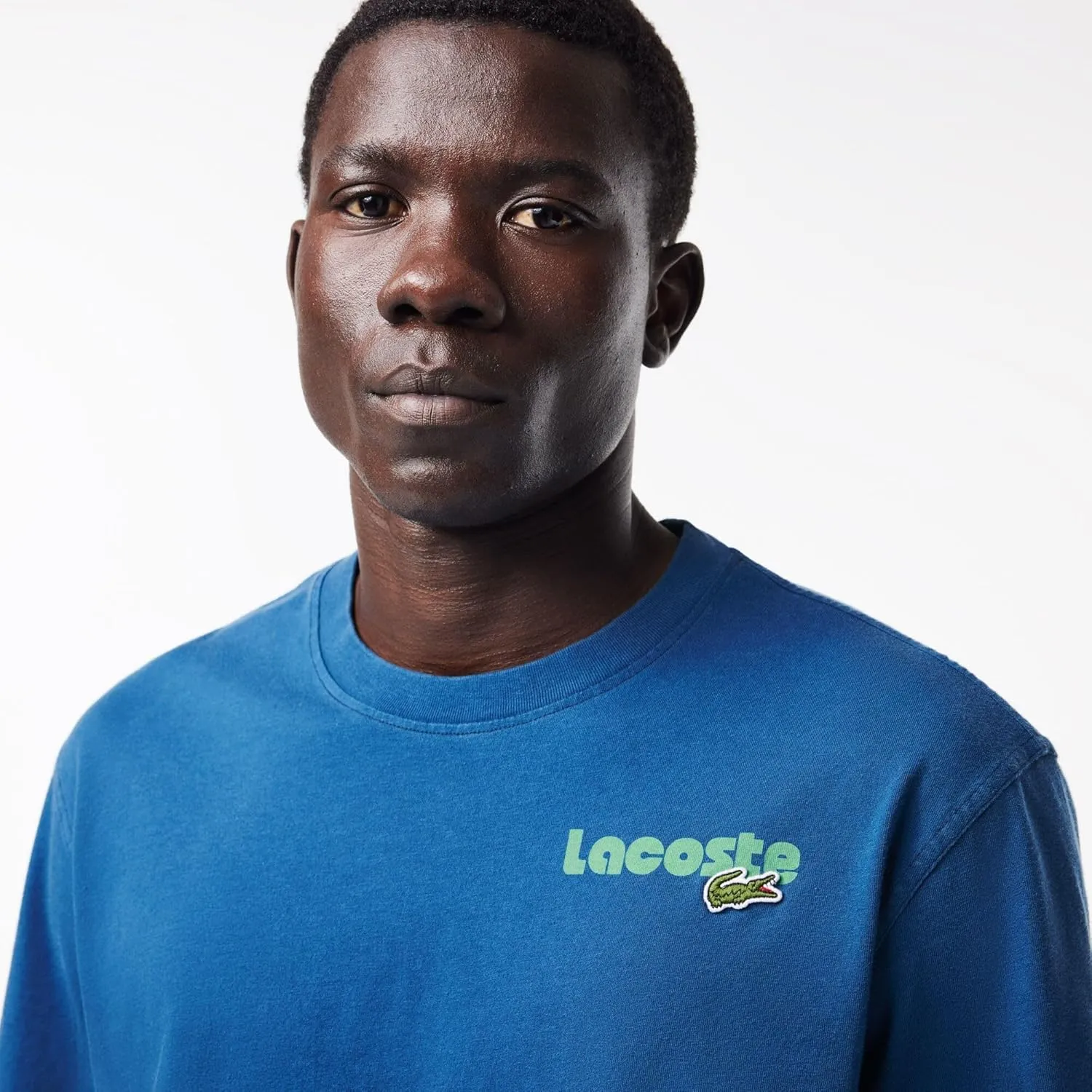 Lacoste Men's Short Sleeve Classic Fit Tee Shirt W Wording on Back